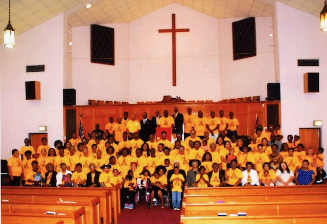 The Metropolitan congregation gathered in the sanctuary